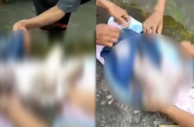 Jenazah bayi saat dievakuasi warga saat ditemukan oleh Wayan Suiti, Minggu (27/3)