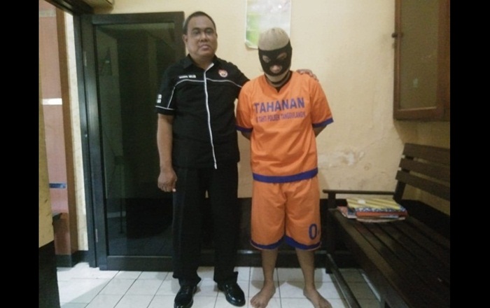 Aris Setiawan usai digelandang oleh Unit Reskrim Polsek Tanggulangin.