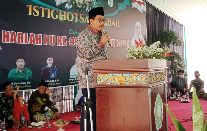 Anggota DPR RI H Aminurrohman saat sambutan acara Harlah NU dan Pergunu di Ponpes Roudlotun Nur Salim, Podokaton, Gondangwetan, Pasuruan, Minggu (27/03/2022). foto: AHMAD FUAD/BANGSAONLINE