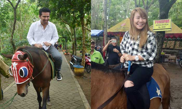 Bupati Trenggalek Emil Dardak dan Wali Kota Catbalogan, Hon Stephany Uy Tan, saat mengelilingi Hutan Kota sambil berkuda. foto: HERMAN/ BANGSAONLINE