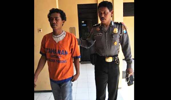 Adi Priono saat digelandang tugas ke jeruji besi.
