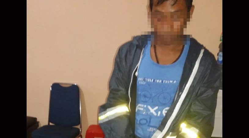 Tersangka saat diamankan di Mapolres Ngawi.