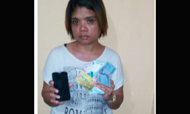 Tersangka saat diamankan di Mapolsek Buduran.