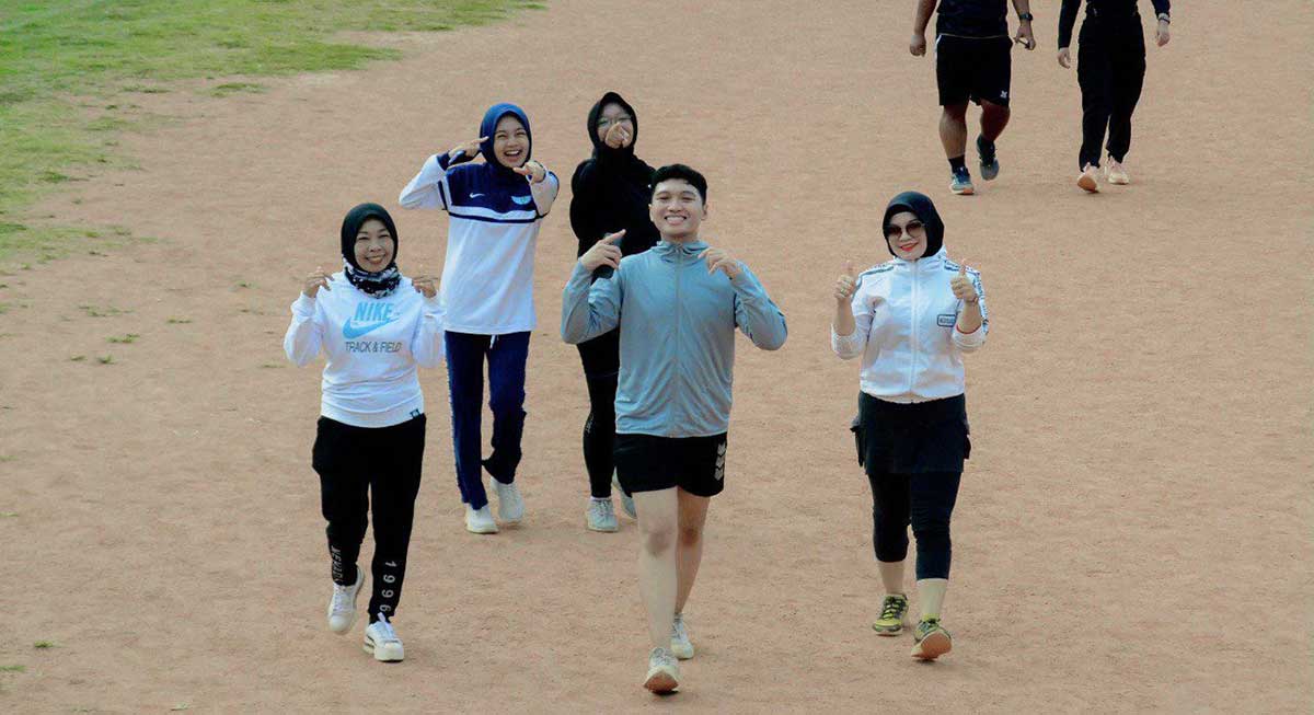 Peserta JKN yang merupakan mahasiswa asal Kabupaten Madiun, Yudha (tengah).