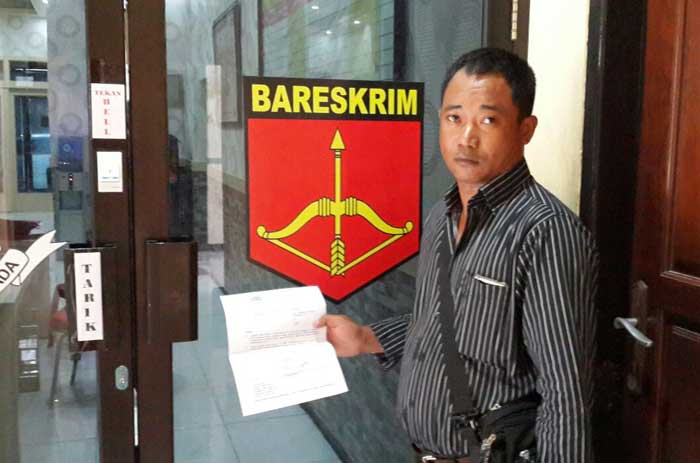 Korban usai melapor ke Bareskrim Polres Sidoarjo.