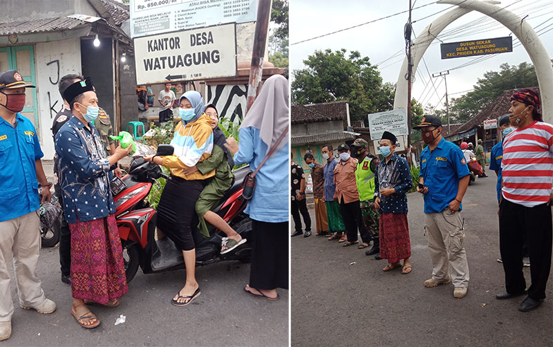 Agus Suyanto bersama relawan saat bagi-bagi sarung dan nasi bungkus kepada warga dan pengendara yang melintas di Jalan Raya Wisata Taman Safari.