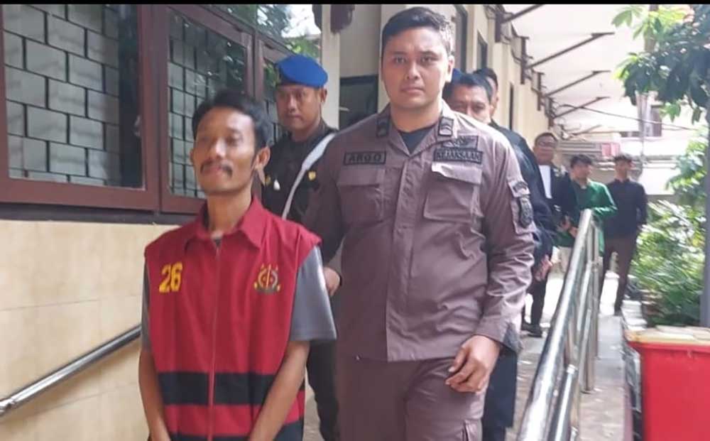 Terdakwa Yusak Cahyo Utomo (35) saat digelandang usai mengikuti sidang agenda pembacaan tuntutan.