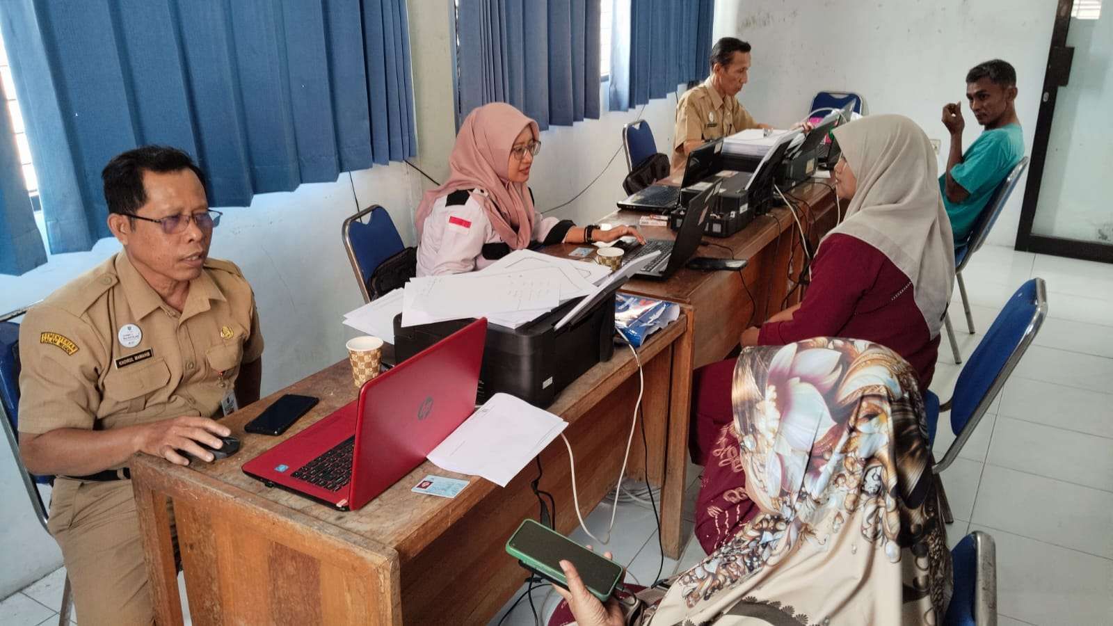 nas Penanaman Modal dan Pelayanan Terpadu Satu Pintu  Kabupaten Jombang memberikan pendampingan penerbitan Nomor Induk Berusaha (NIB