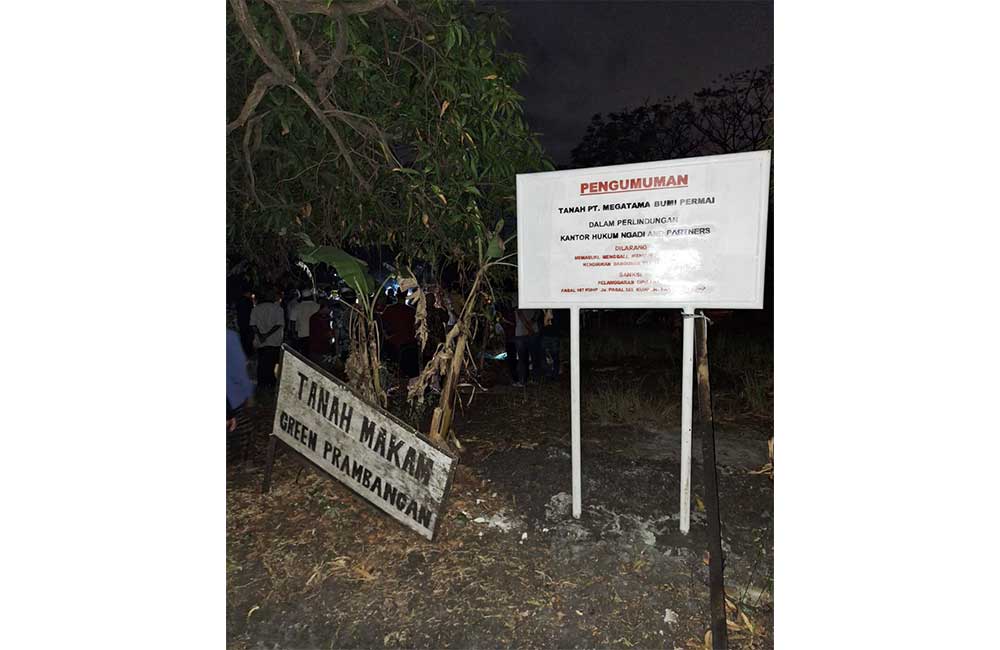 Papan larangan yang dipasang PT Megatama Bumi Permai di fasum makam Perum GPR. Foto: Ist.