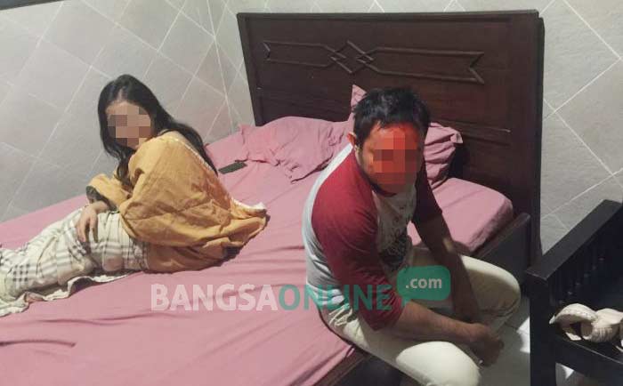 MJ dan LPS saat digerebek di hotel Bintang. foto: SUWANDI/ BANGSAONLINE